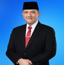 Drs. H. Edward Candra, M.H.